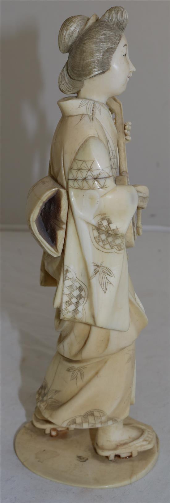 A Japanese sectional ivory figure of a bijin, early 20th century, 26.5cm